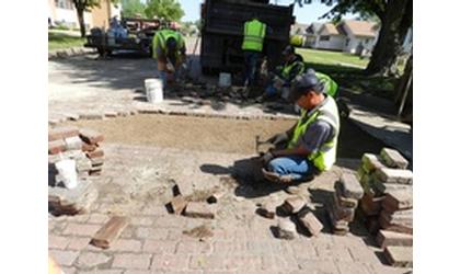 Street Department removes dip, adds curb ramps