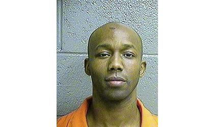Inmate charged in killing