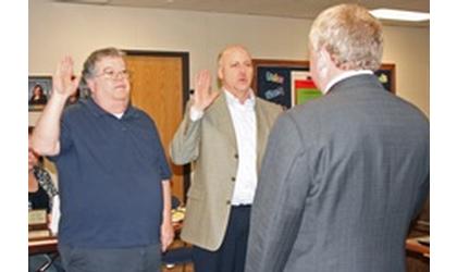 Clark, Nuzum sworn in for school board terms