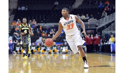 Marcus Smart returns, leads Cowboys to win