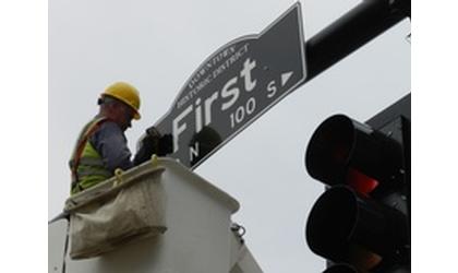 Signs, lights up at First and Grand