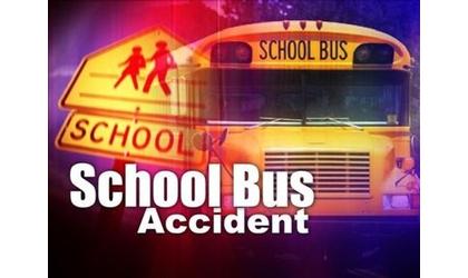 School bus collides with car during improper turn