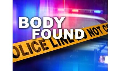 Authorities work to identify man found dead on highway