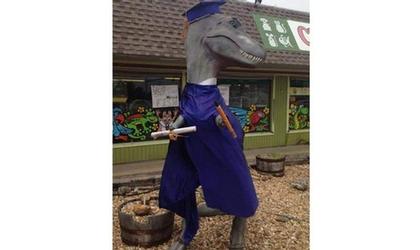 Dinosaur statue found in pieces