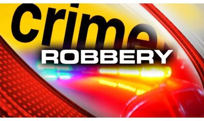 Five arrested in robbery case
