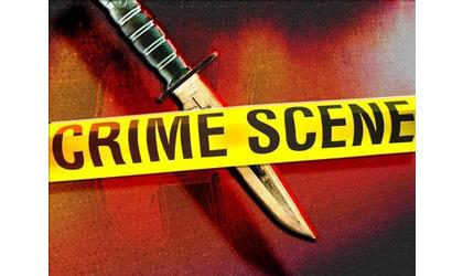 Woman arrested in Arkansas City stabbing