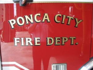 Woman dies in city house fire