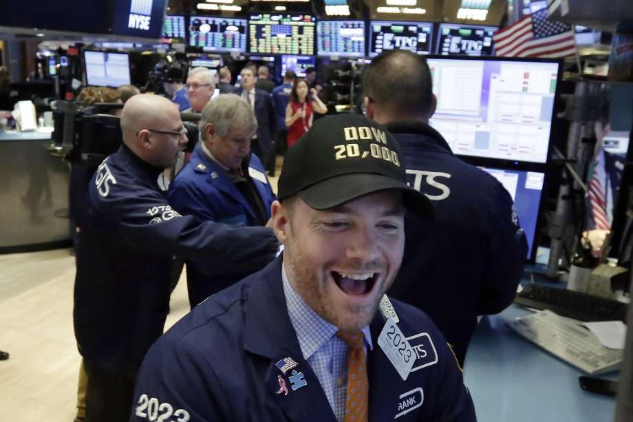Dow Jones closes above 20,000 for first time