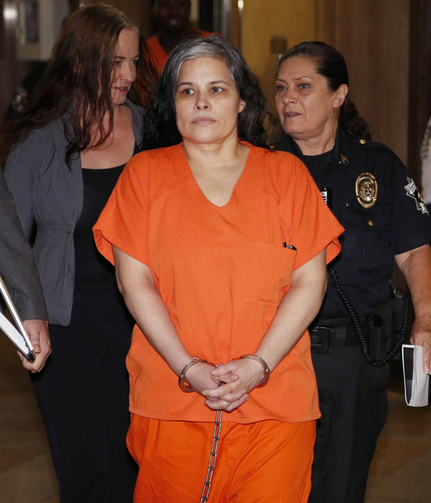 Woman sentenced to life in daughter’s crucifix death
