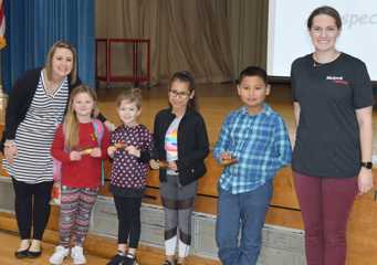 Woodlands PIE Partners present gift cards to students