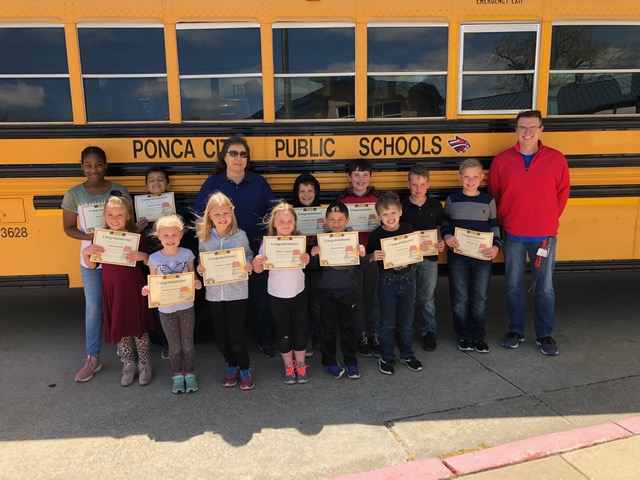 Bus #17 students receive certificates for achieving reading goals