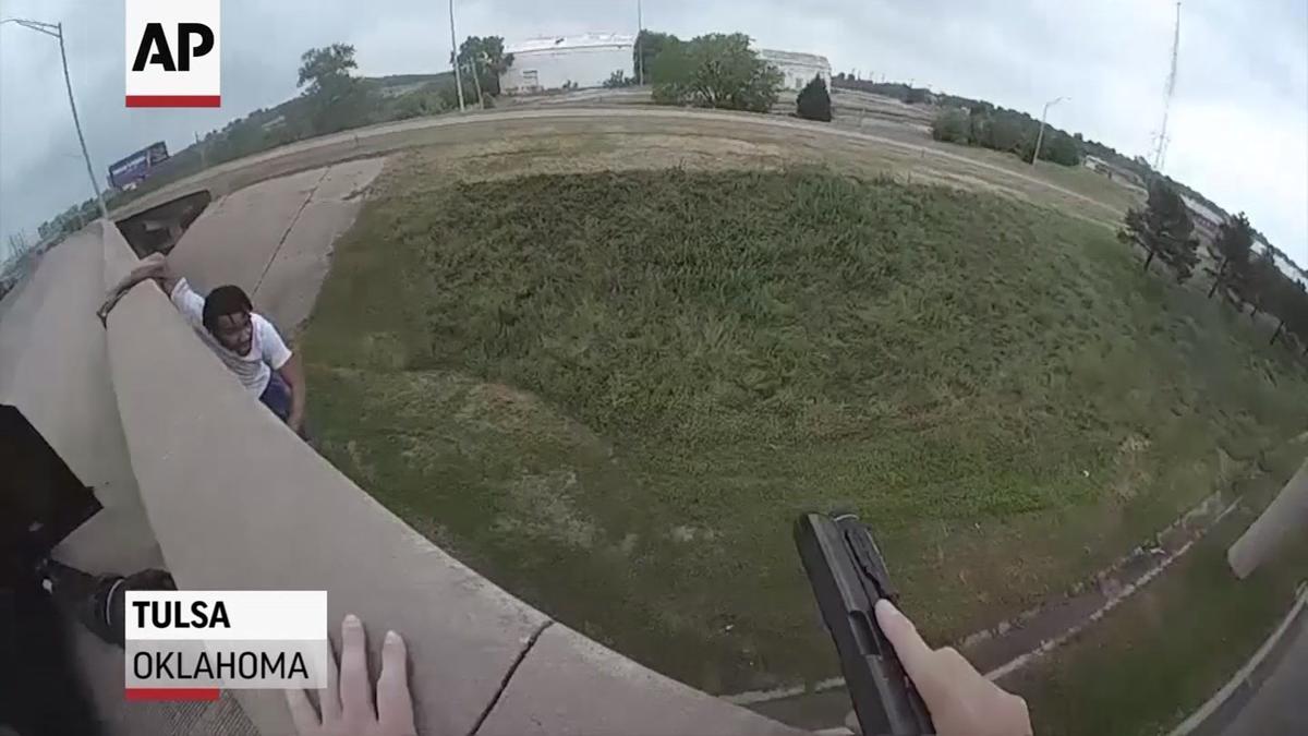 Police video shows man falling from Tulsa bridge after chase
