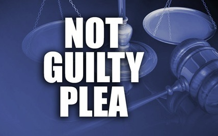 Woman pleads not guilty in deaths of her 3 kids in Arizona