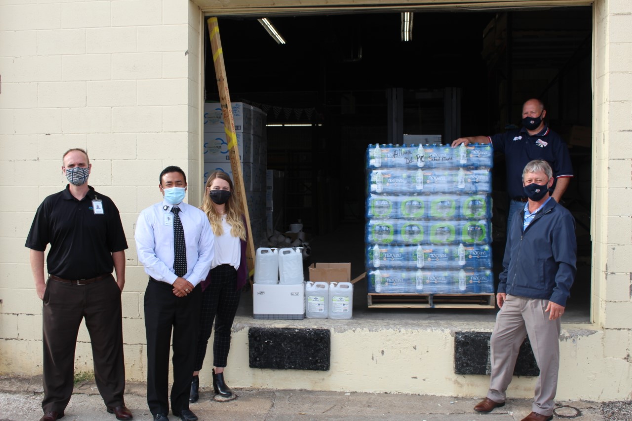 Alliance Health Ponca City Donates Water and Sanitizer to PCPS District