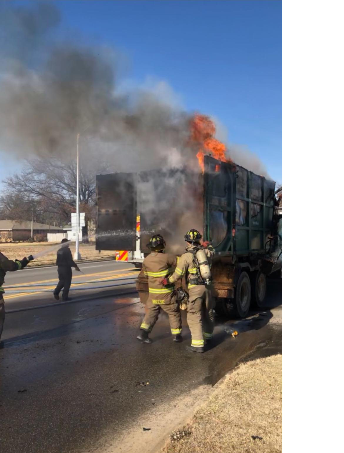 Sanitation truck catches fire Monday