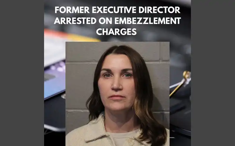 FORMER EXECUTIVE DIRECTOR ARRESTED ON EMBEZZLEMENT CHARGES